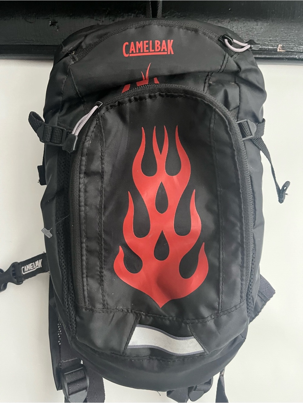 CamelBak Black Backpack with Red Flame Graphic Accent